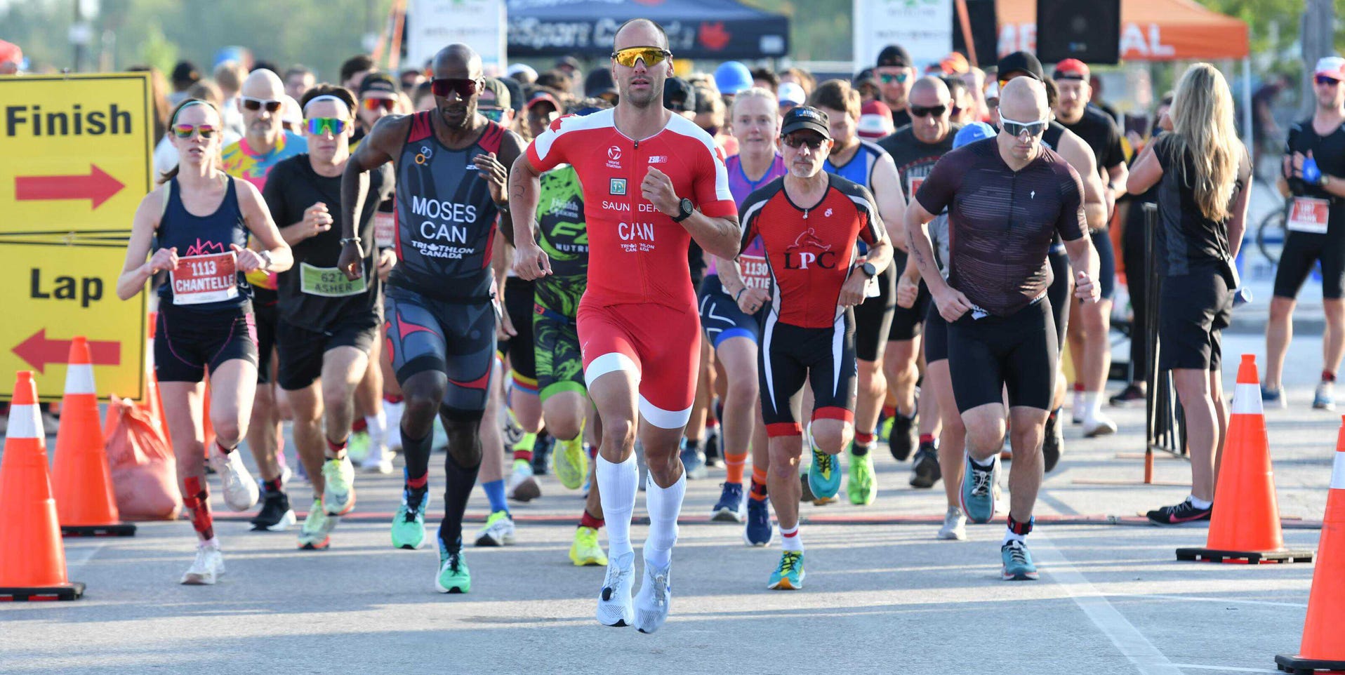 Intense moment of a women's soccer match with focused players in action.
